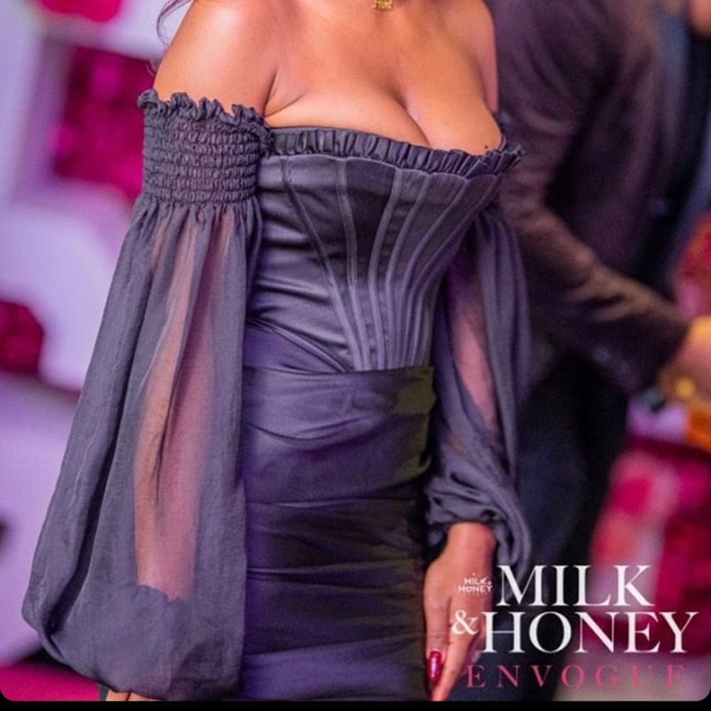 House of CB black dress.  Corset top with ruffles , satin sleeve and bottom